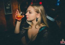 Girl In Florence Night Club Drinking Bacardi